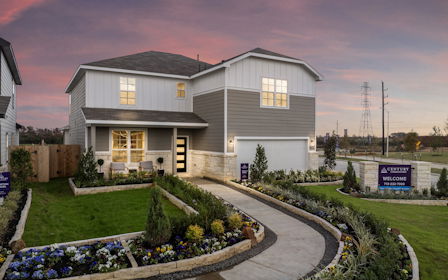 A house with a garden in front.