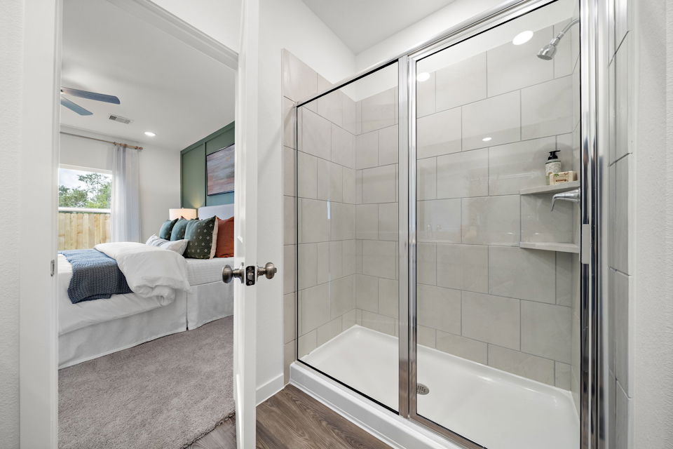 A bathroom with a glass shower.