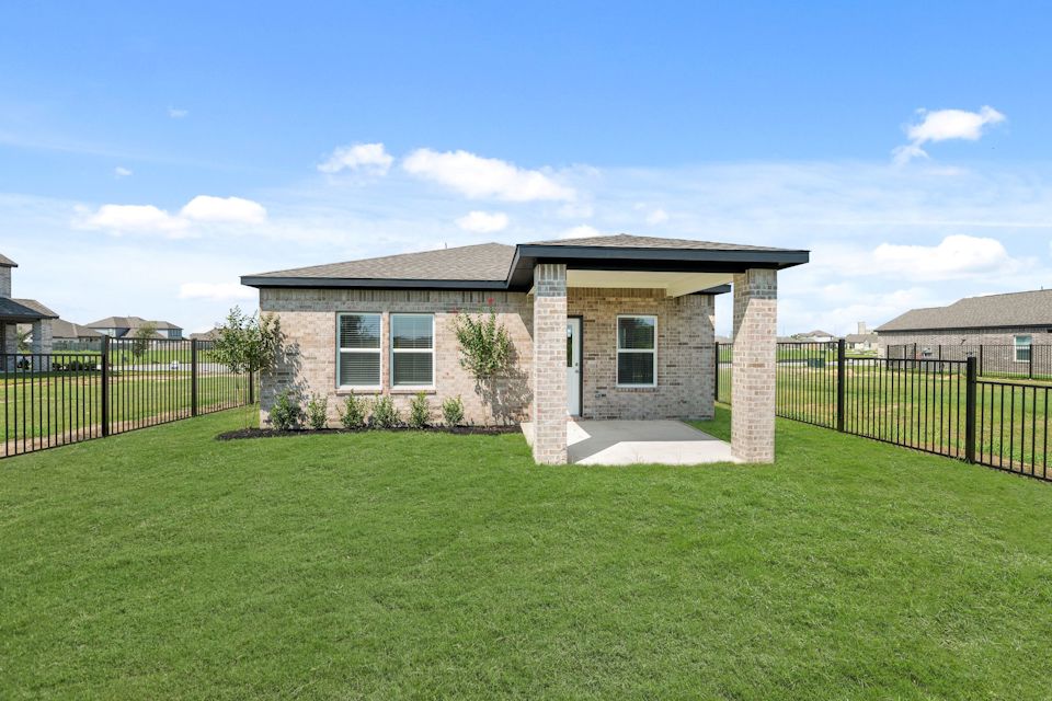 A house with a fence around it.