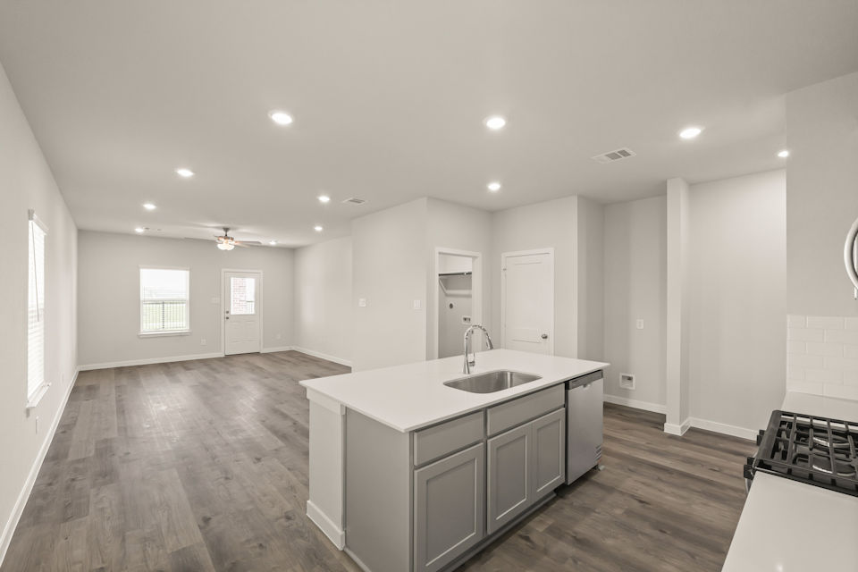 A kitchen with a large island.