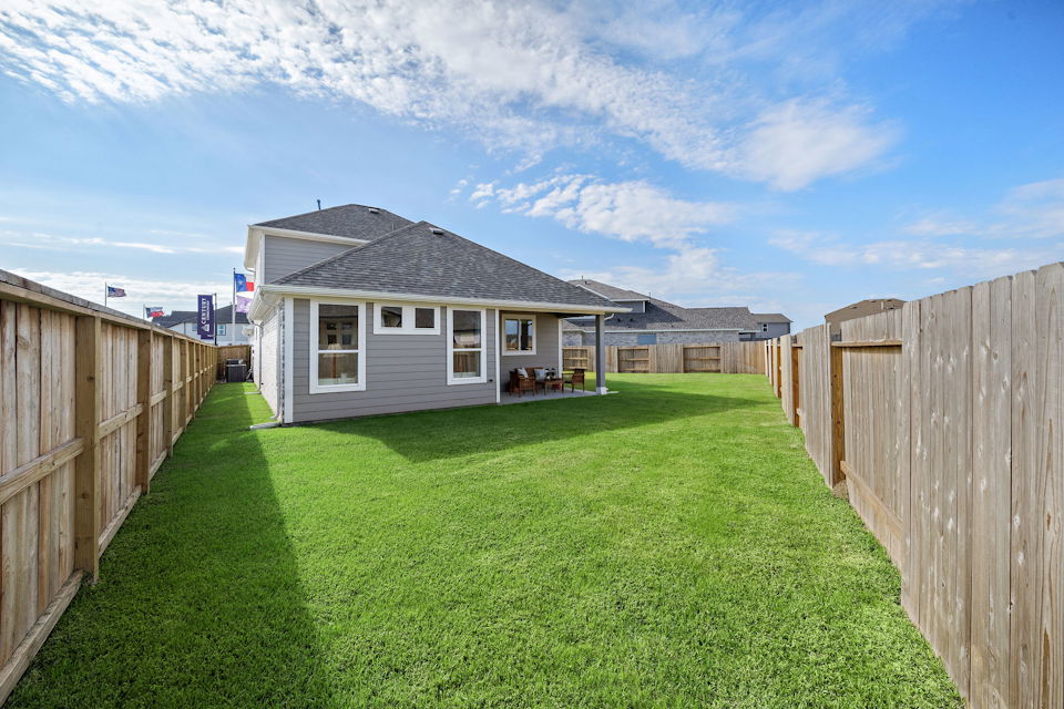 A house with a fence around it.