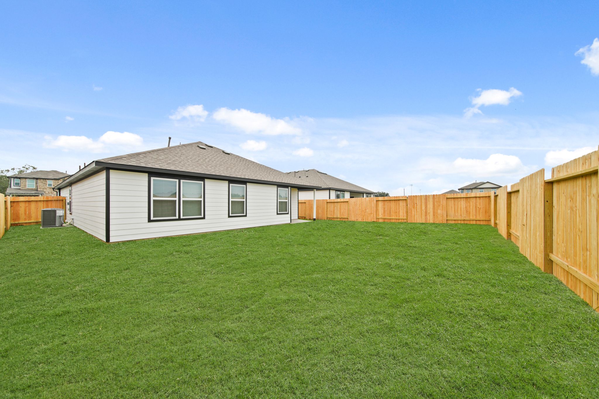 A house with a fence around it.