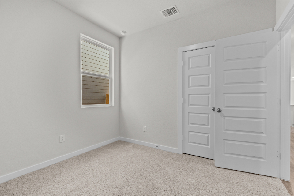 A room with white doors.