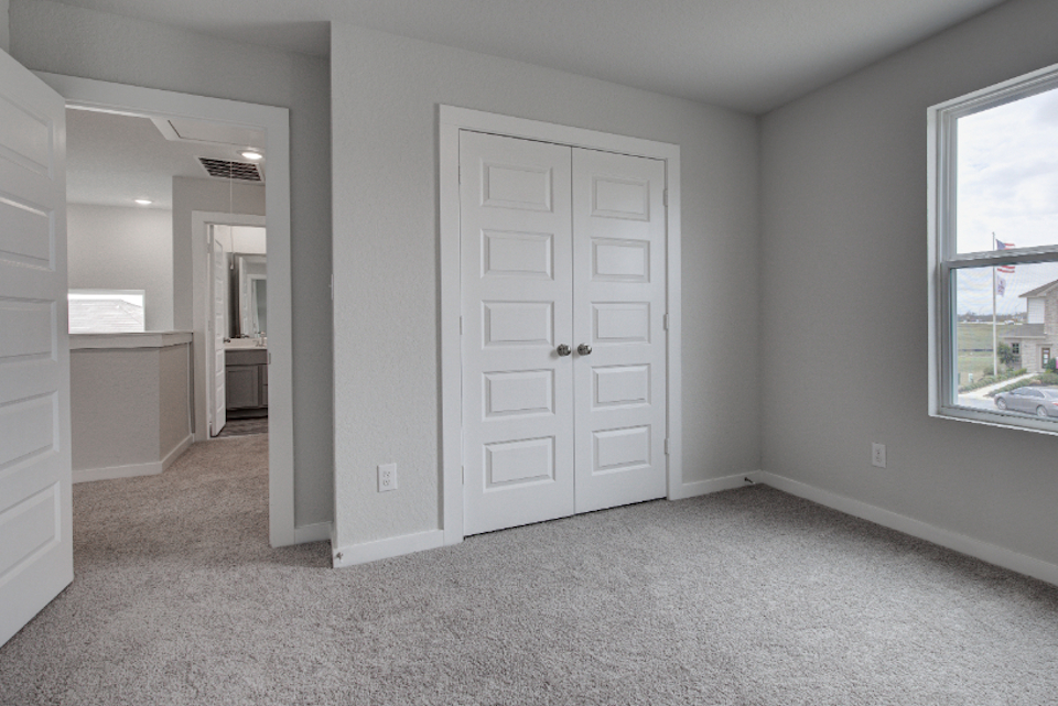 A room with white doors.