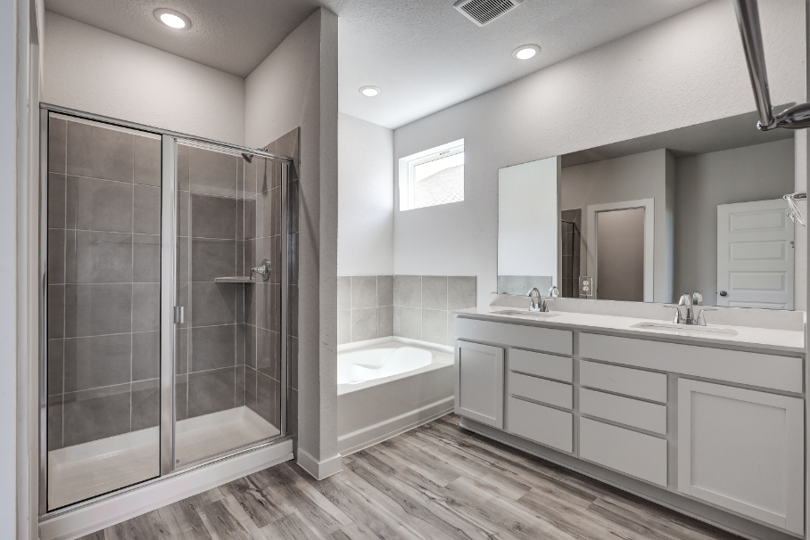 A bathroom with a glass shower.