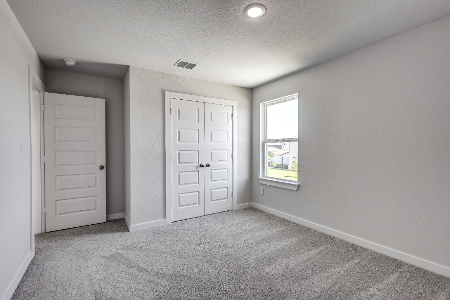 A room with white doors.