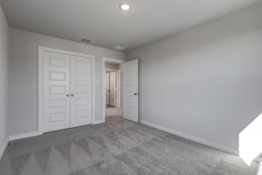 A room with white doors.