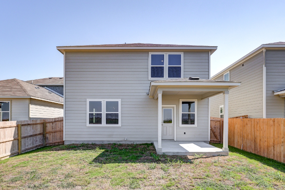 A house with a fence around it.