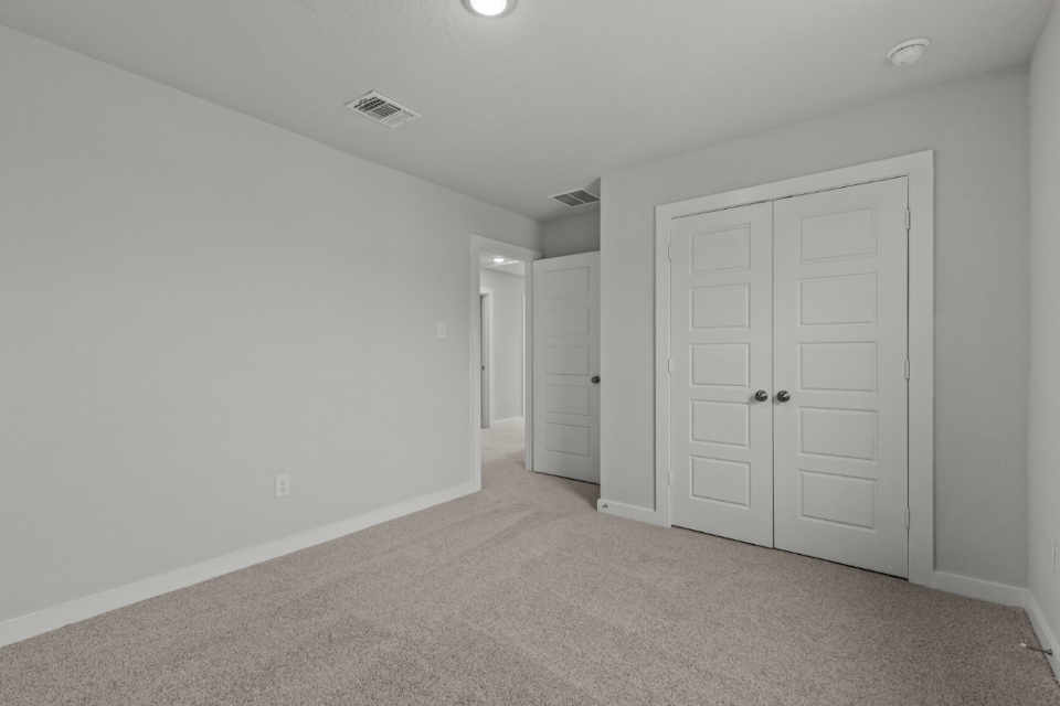 A room with white doors.