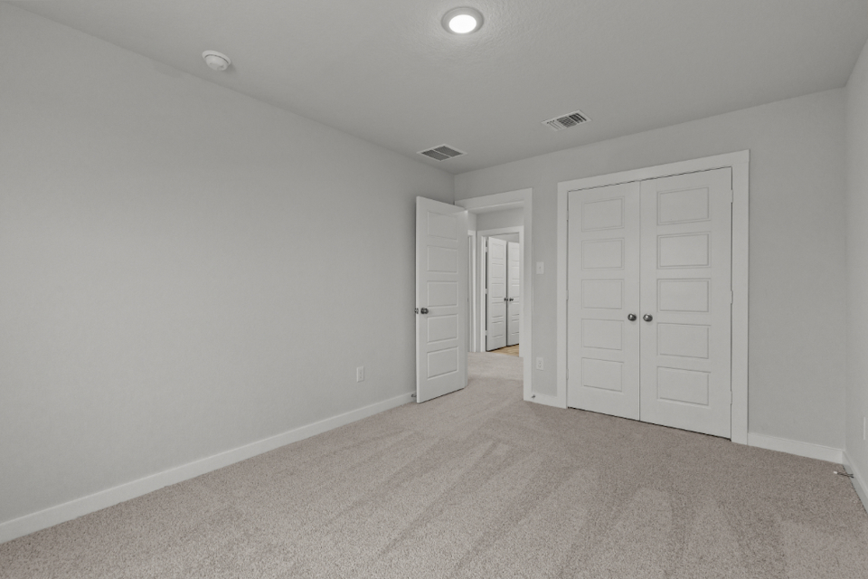 A room with white doors.