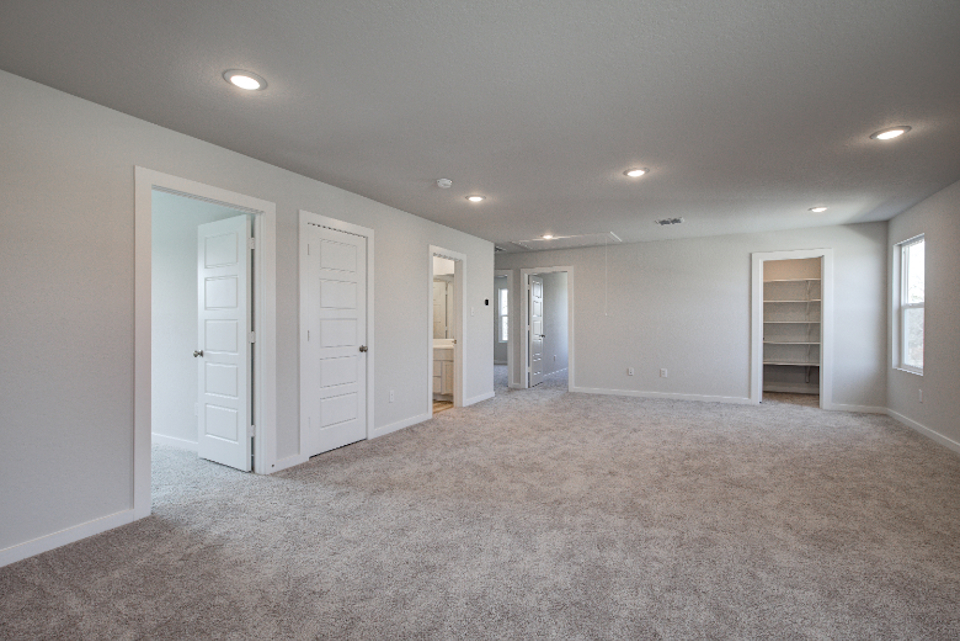 A room with white doors.