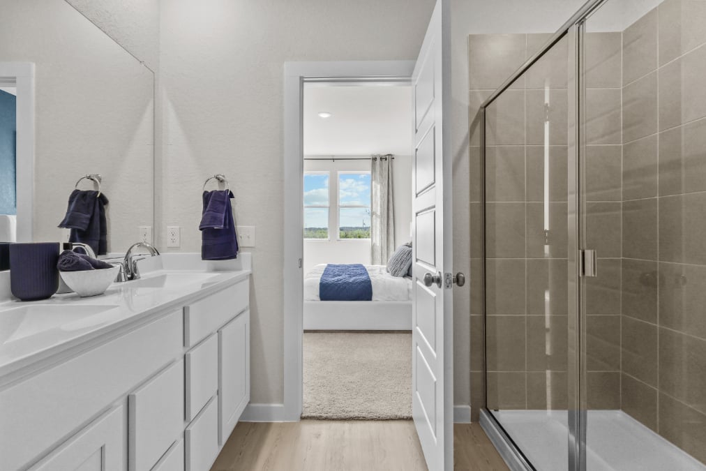 A bathroom with a glass shower.