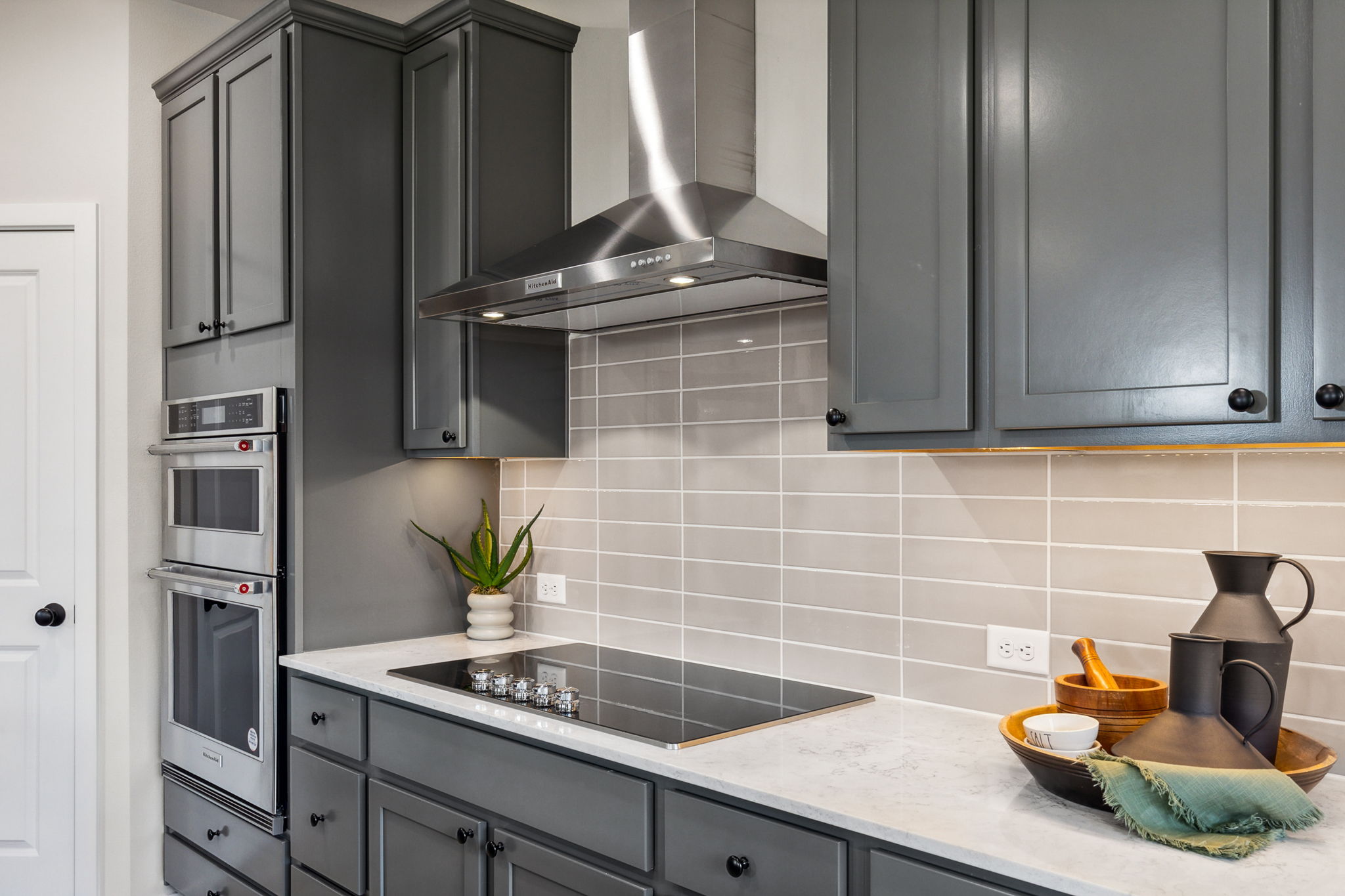A kitchen with stainless steel appliances.