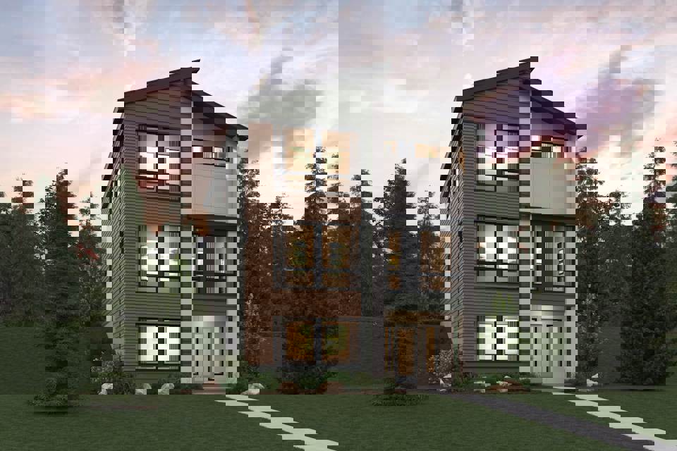 A house with a lawn and trees around it.