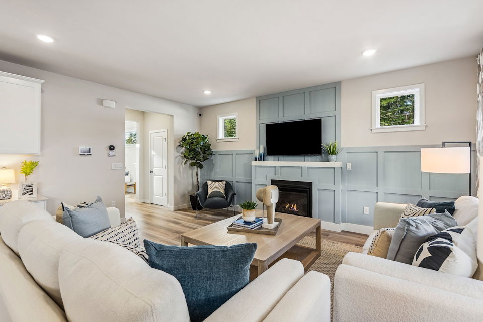 A living room with a fireplace.