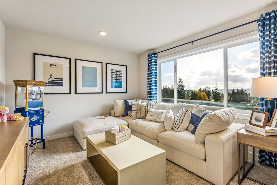 A living room with a couch and a coffee table.