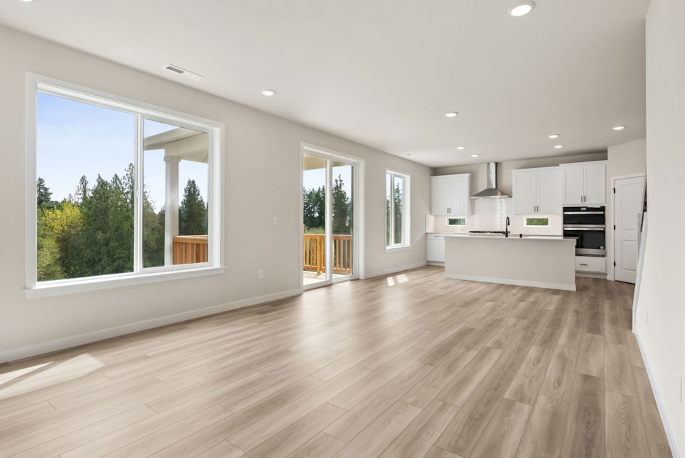 A large kitchen with white cabinets.