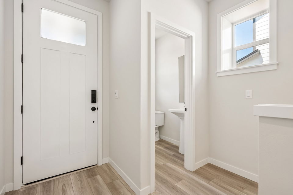 A bathroom with a sink and a toilet.
