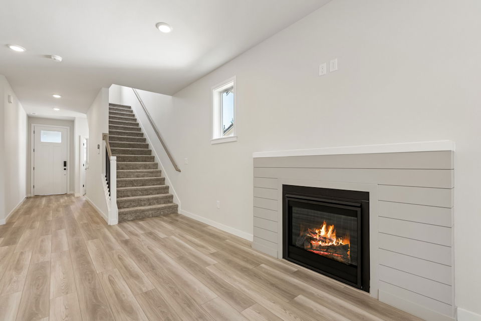 A fireplace in a room.