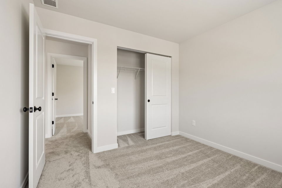 A room with white doors.