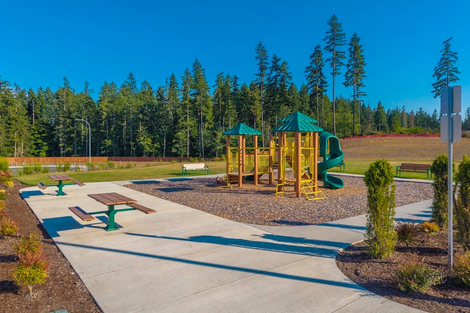 A small play structure in a park.