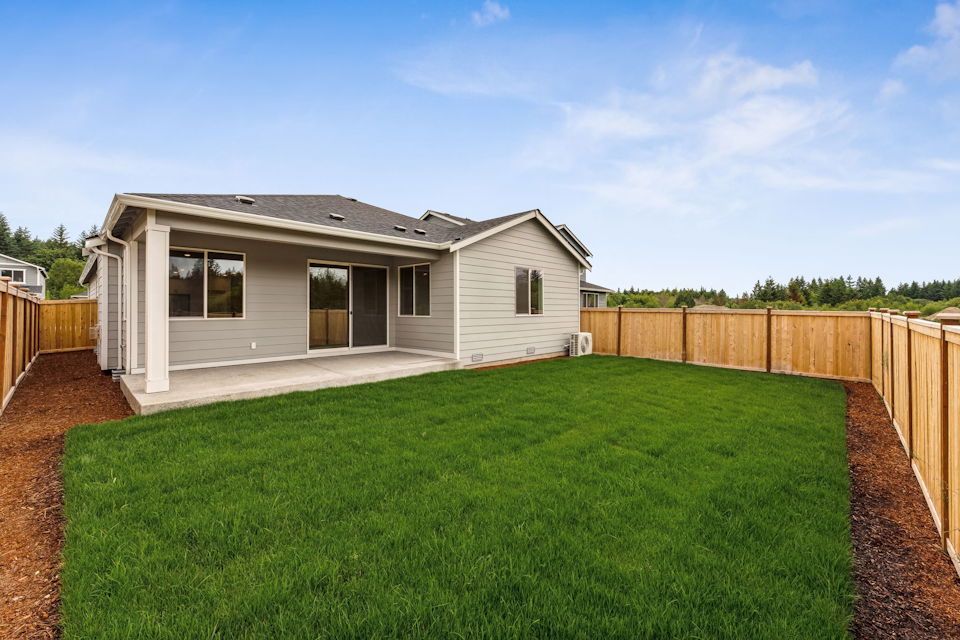 A house with a fence around it.
