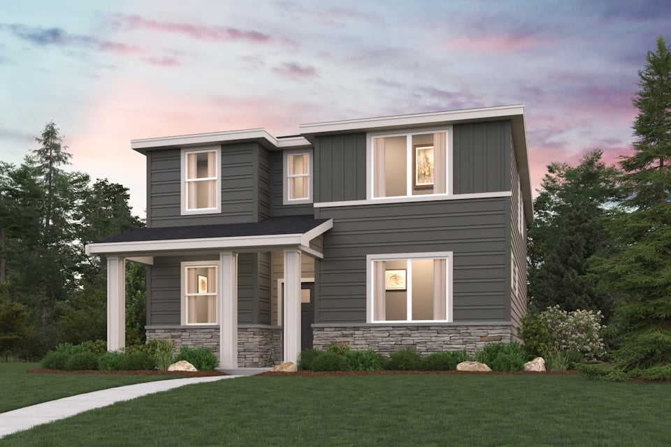 A house with a lawn and trees.