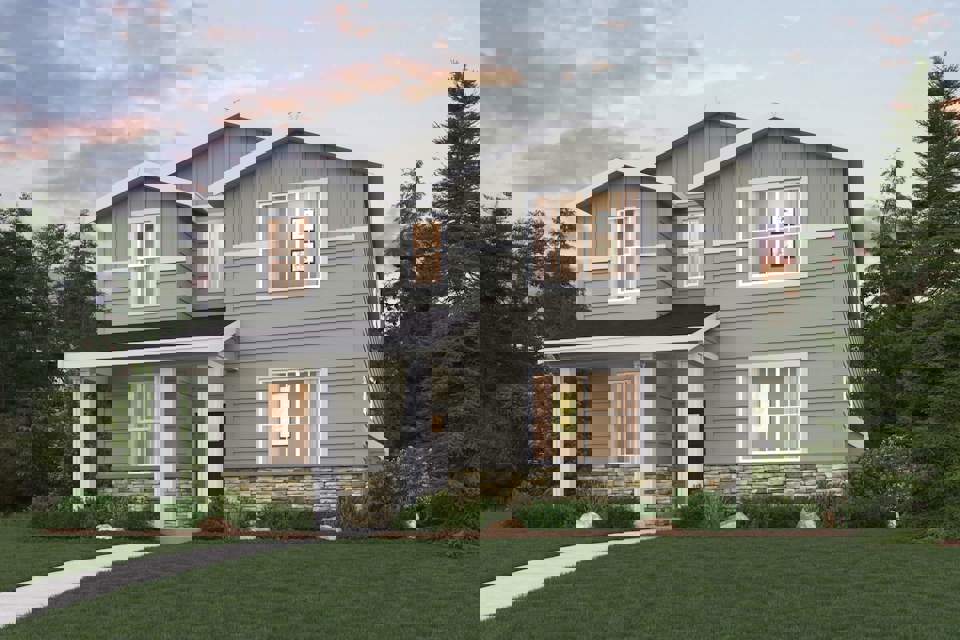 A house with a lawn and trees.