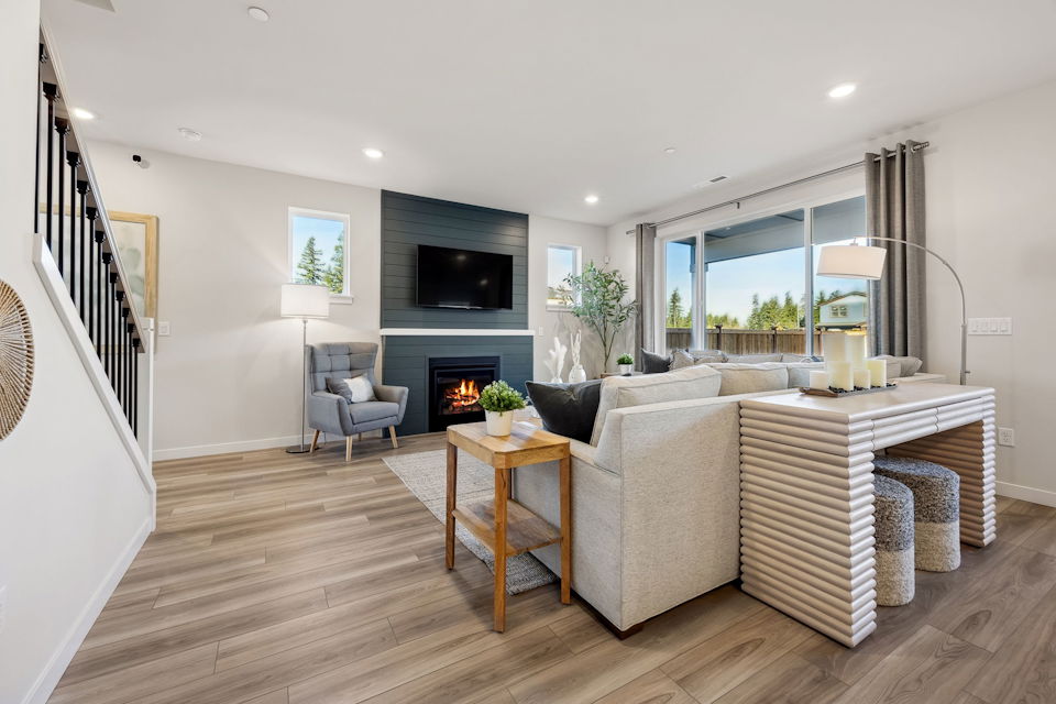 A living room with a fireplace.