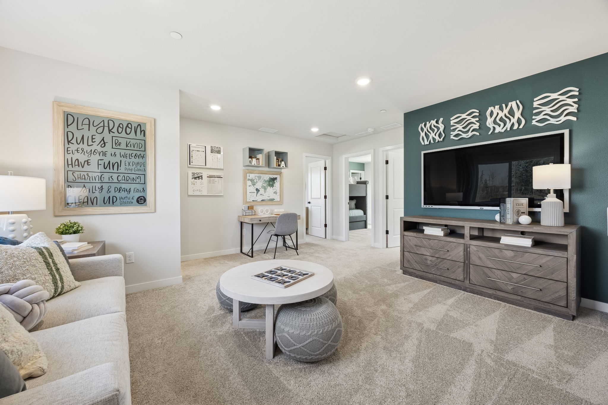 A living room with a tv and couches.