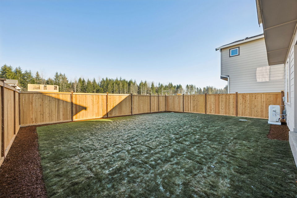 A pool of water next to a building.