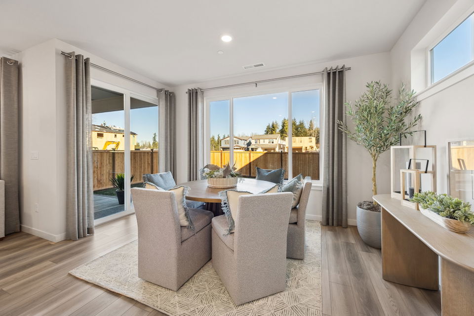 A living room with a large window.