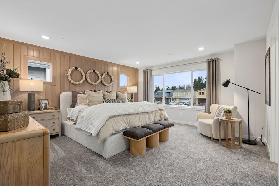 A large living room with a large window.