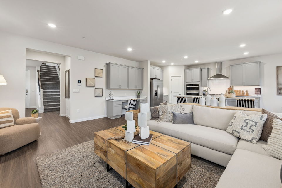 A living room with a couch and a coffee table.