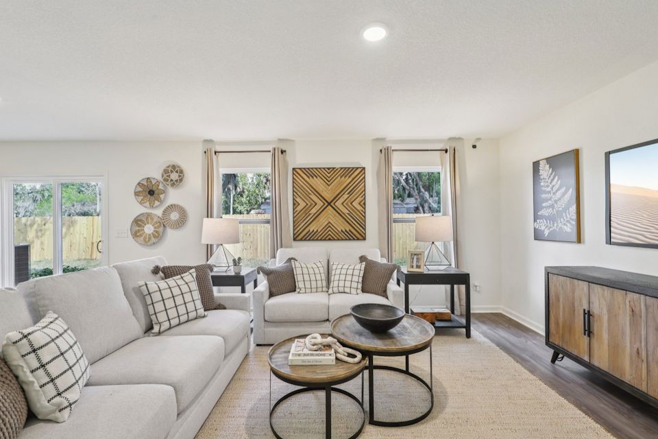 A living room with a large window.