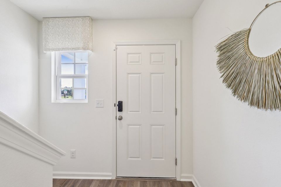 A white door in a room.