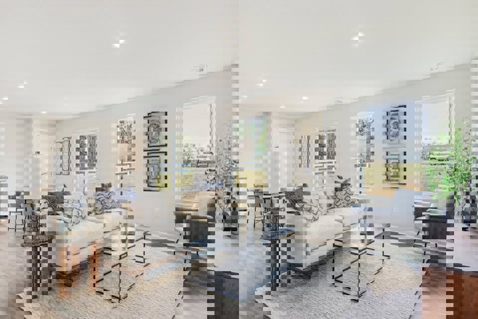 A living room with a large window.