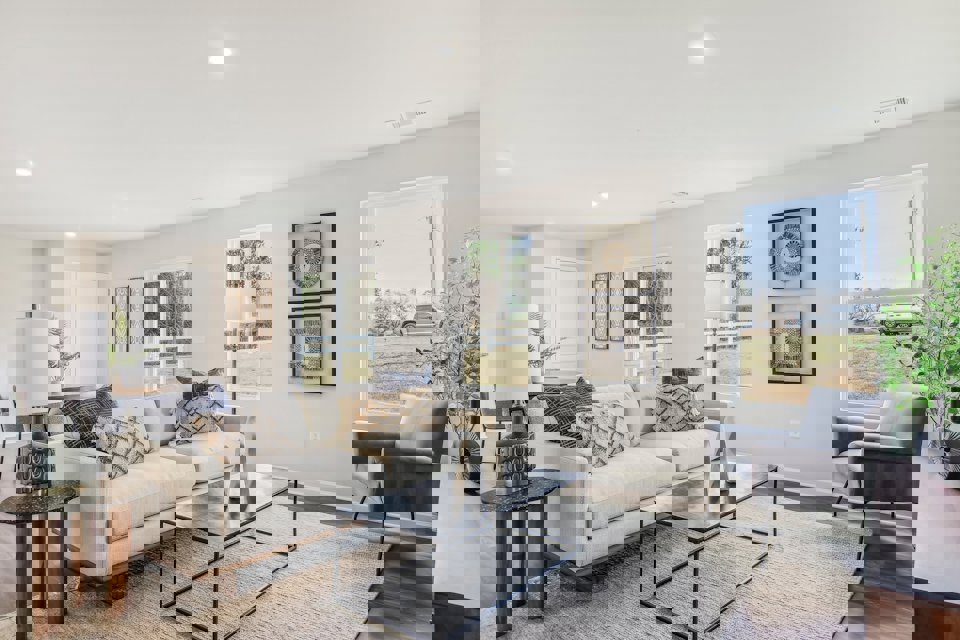 A living room with a large window.