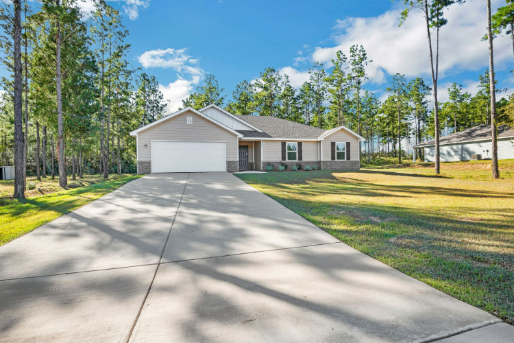 A house with a driveway.
