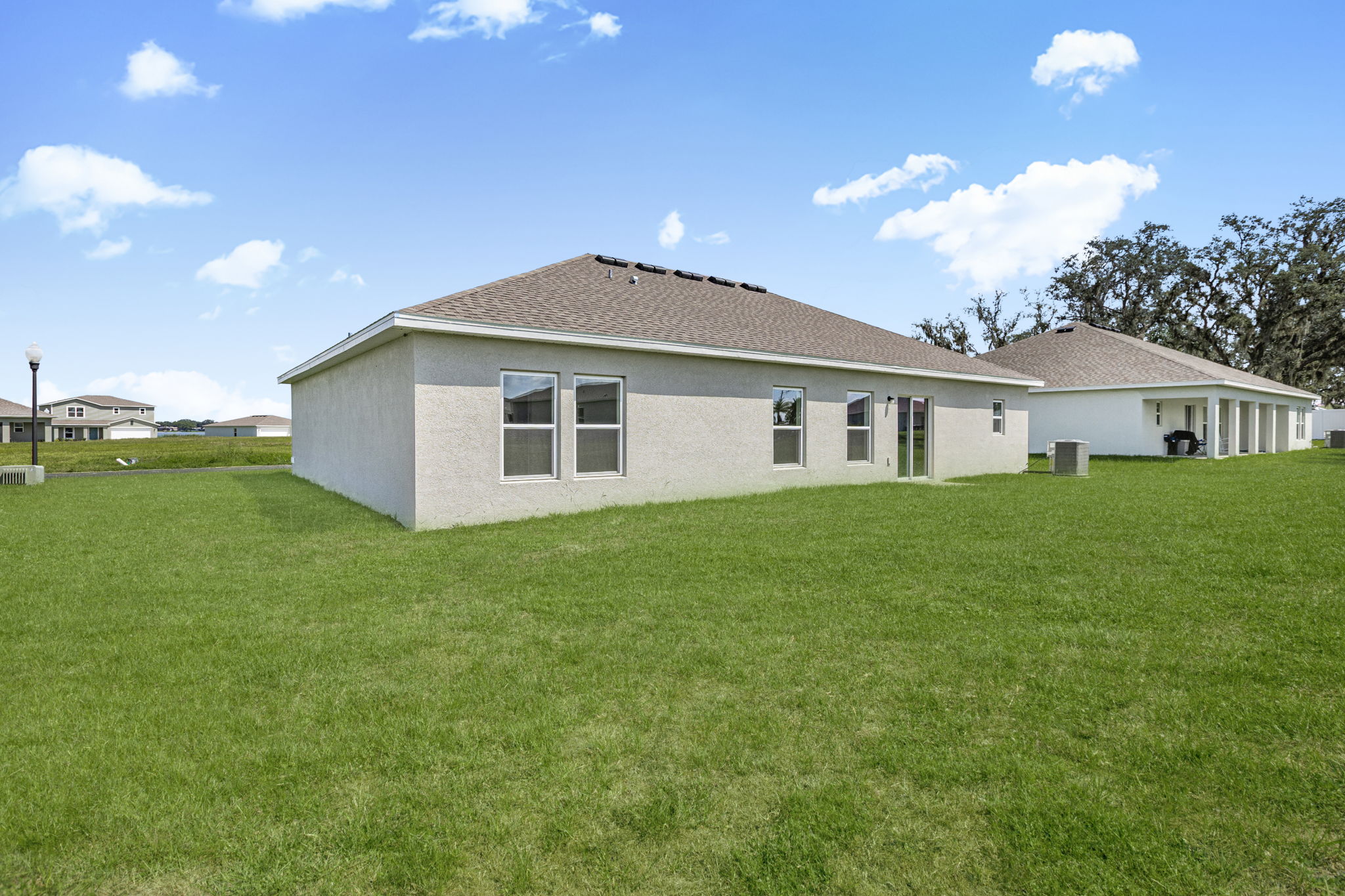 A house with a large lawn.