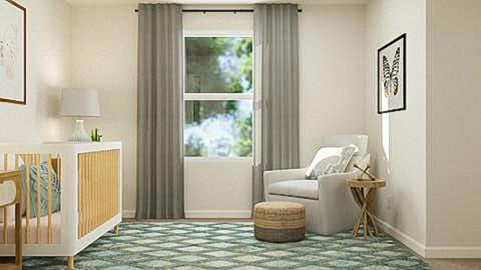 A room with a bed and a chair.