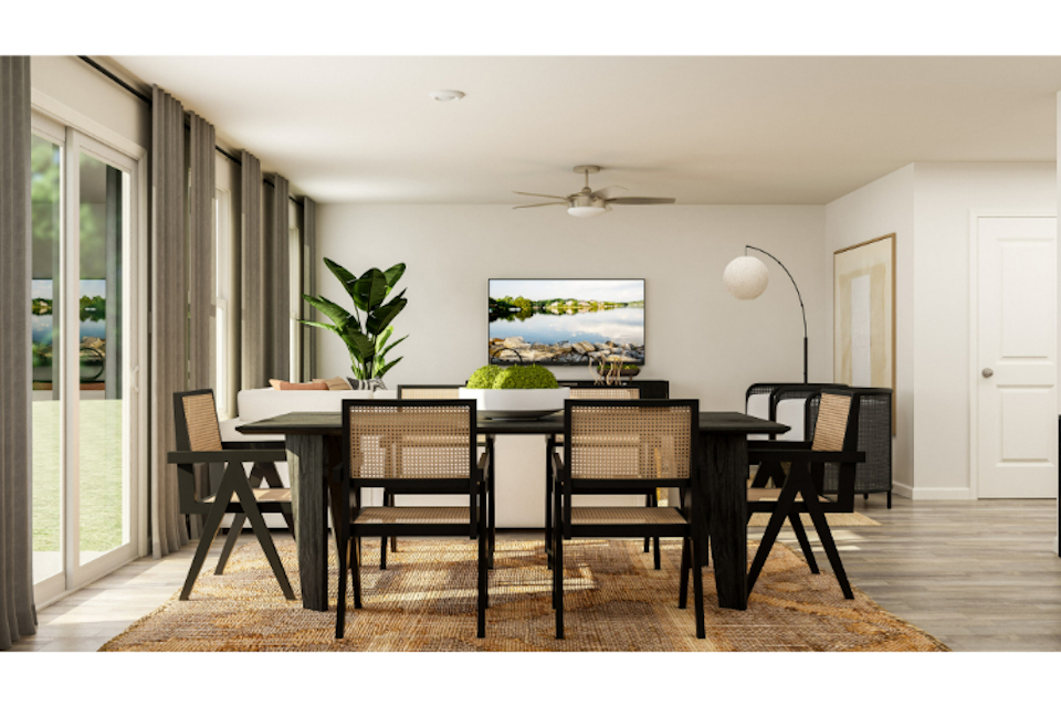 A dining room table with chairs.