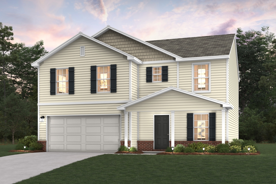 A white house with a driveway.