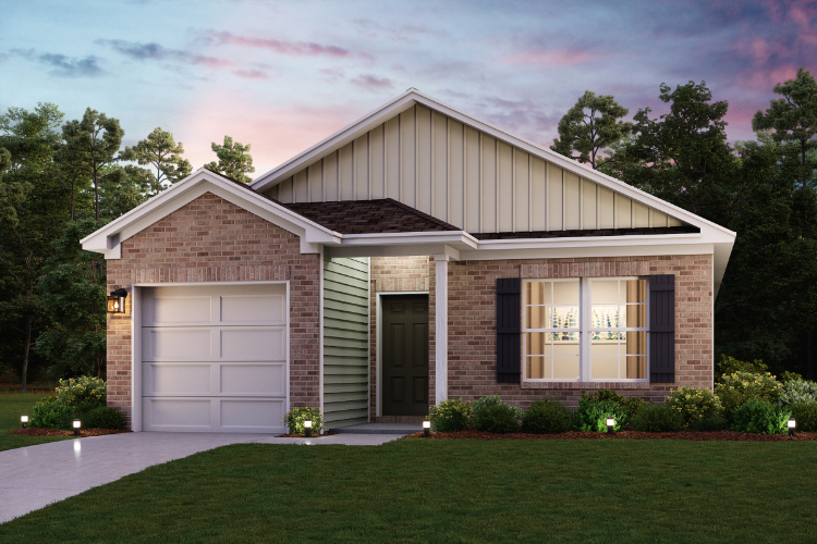 A house with a lawn in front of it.