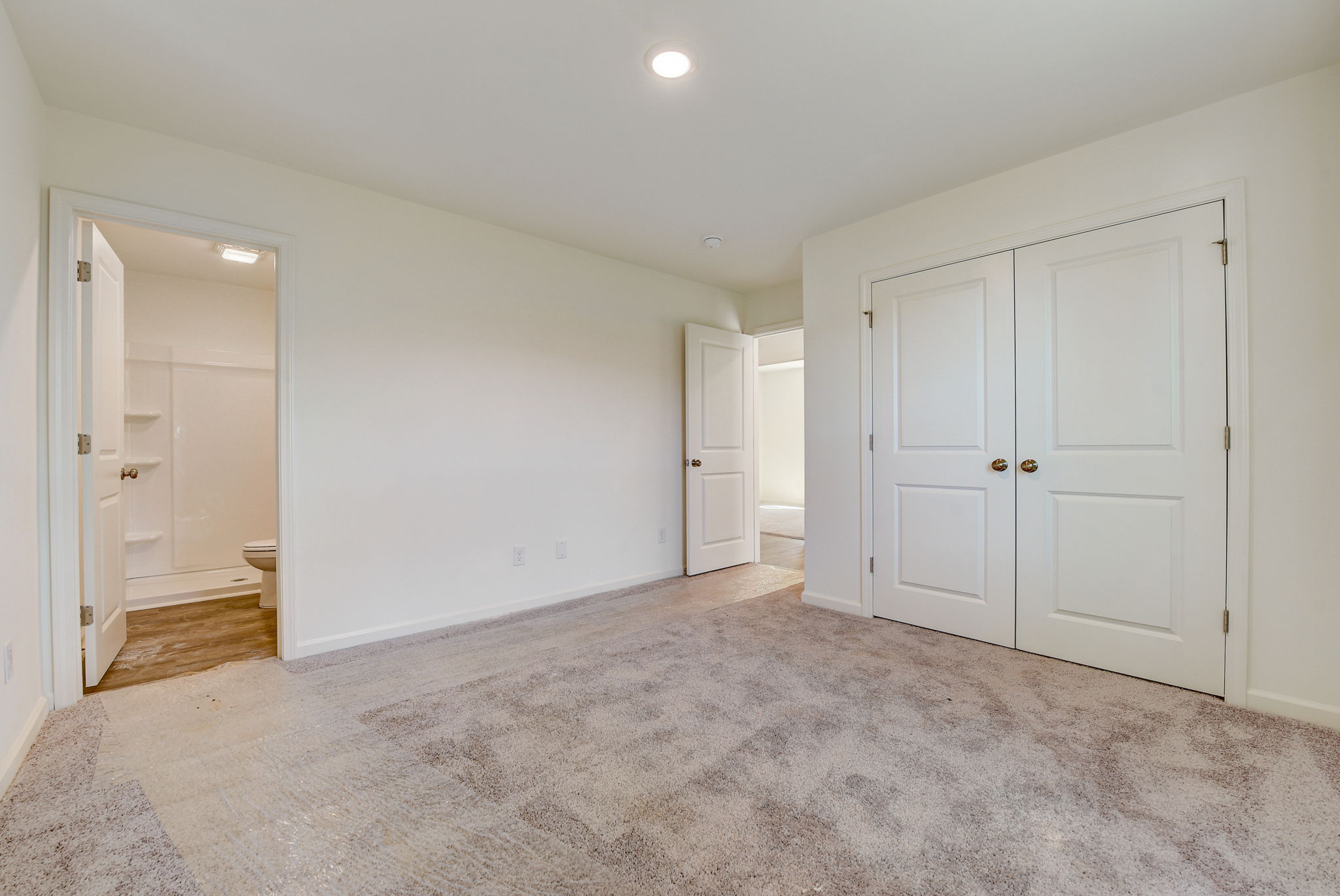 A room with white doors.