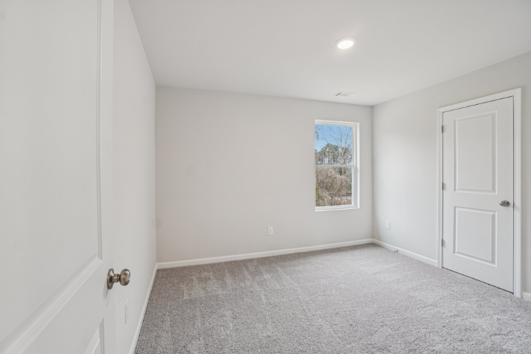 A room with white doors.